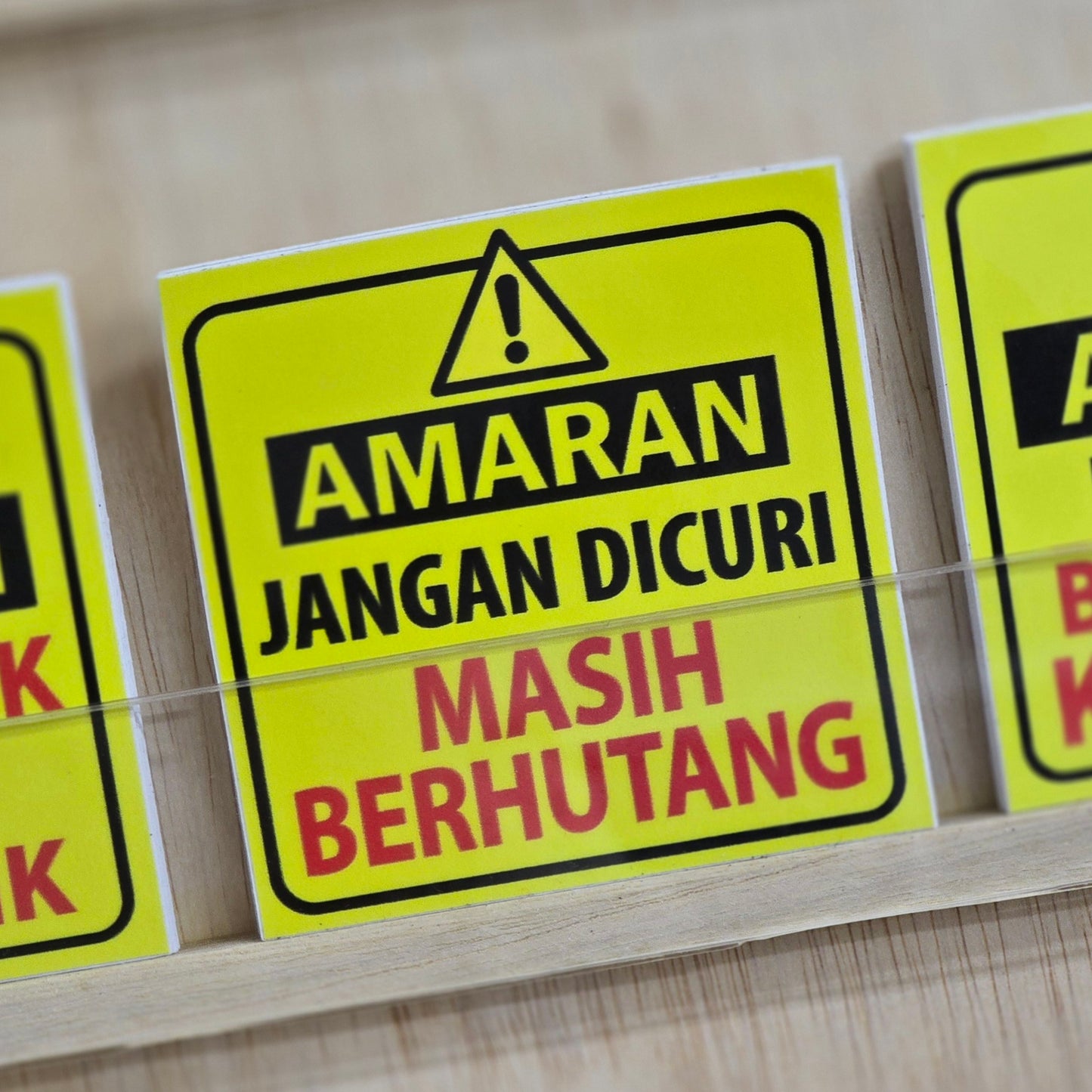 Amaran - Jangan Dicuri, Masih Berhutang